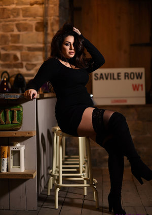 18 year old female Doris G slips off her underwear to pose naked on her bed